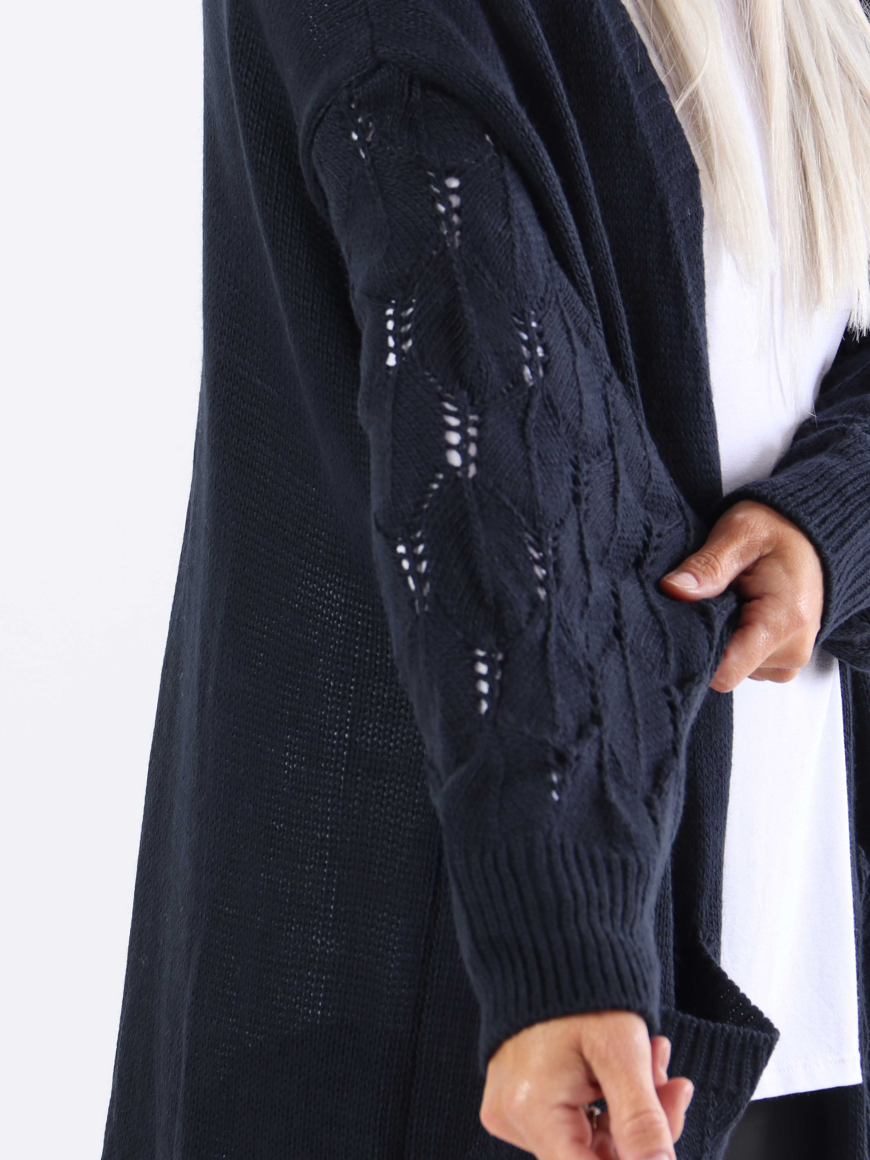 Capri - Plus size strikcardigan med lommer